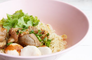 Dry noodles with steamed pork clipart