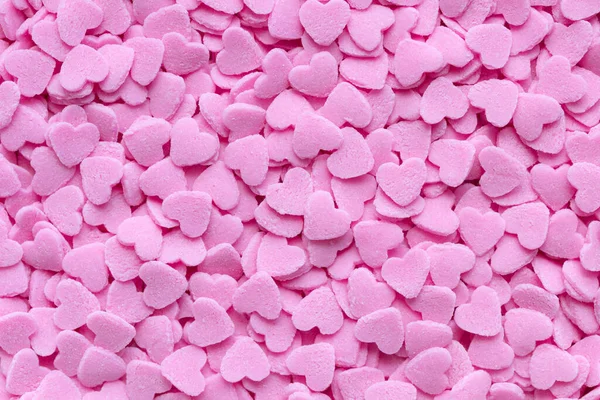 Vista Superior Corazones Pequeños Color Rosa Forma Azúcar Asperja Fondo — Foto de Stock