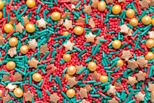 Red Green Sugar Sprinkles Background Golden Small Star Shaped Sprinkles — Foto de Stock
