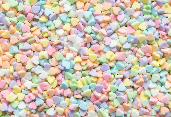 Top View Multicolor Pastel Hearts Hearts Shaped Sugar Sprinkles Background — Foto de Stock