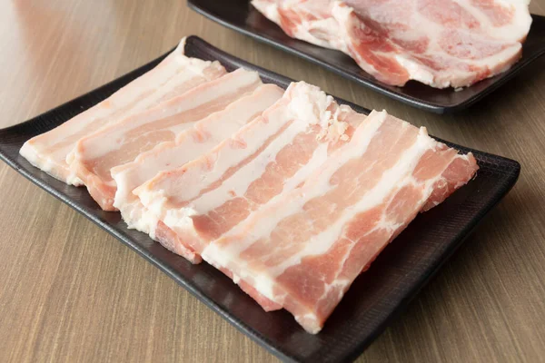 Raw Pork Belly Slices Black Dish — Stockfoto