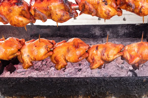 Roasted Whole Chicken on Charcoal Stove. Thai Street Food
