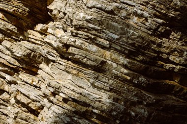 Rocks on the coast of the Adriatic Sea, Montenegro. Stone background. Selective focus.