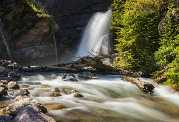 Baring Falls, photographed in motion-blur, is a waterfall located along the same trail as St. Mary and Virginia falls in Glacier National Park, Montana. 