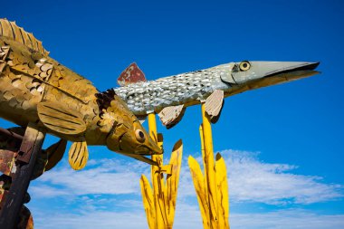 Dickinson, ND, USA - Jun 19, 2022: Fisherman's Dream is 1 of 8 scrap metal sculptures constructed along the 32-mile Enchanted Highway. The collection is considered the world's largest. Artist Gary Greff conceived of the project.