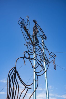 Regent, ND, USA - Jun 19, 2022: Teddy Rides Again is 1 of 8 scrap metal sculptures constructed along the 32-mile Enchanted Highway. The collection is considered the world's largest. Artist Gary Greff conceived of the project.