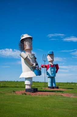 Regent, ND, USA - Jun 19, 2022: The Tin Family is 1 of 8 scrap metal sculptures constructed along the 32-mile Enchanted Highway. The collection is considered the world's largest. Artist Gary Greff conceived of the project.