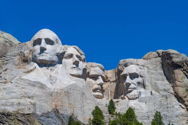 Mount Rushmore National Memorial depicts the U.S. presidents George Washington, Thomas Jefferson, Theodore Roosevelt and Abraham Lincoln are carved into Mount Rushmore in the Black Hills. 