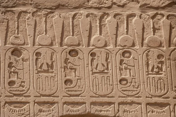 Ancient Egyptian Hieroglyphs Carved Stone Wall Karnak Temple Luxor Egypt Stock Photo