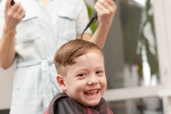 Mother Hairdryer Her Hand Light Blue Dress Doing Her Son — Stock Photo, Image