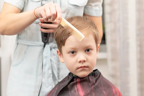 Young Mom Hairdresser Cuts Her Baby Boy Home Hair Clipper — Stock Photo, Image