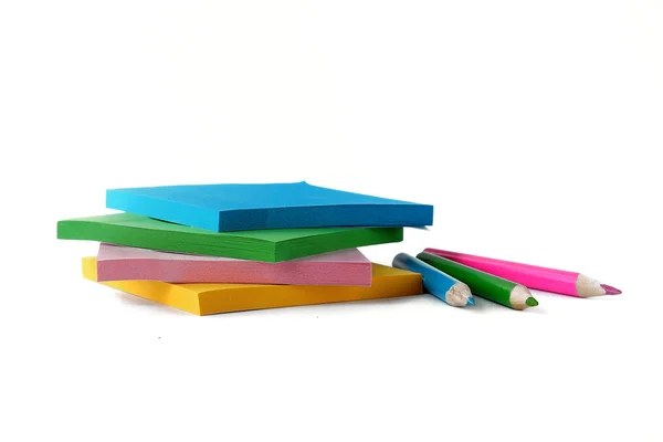 Notebook paper and pencils — Stock Photo, Image