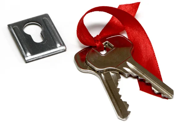 A bunch of keys and keyhole — Stock Photo, Image