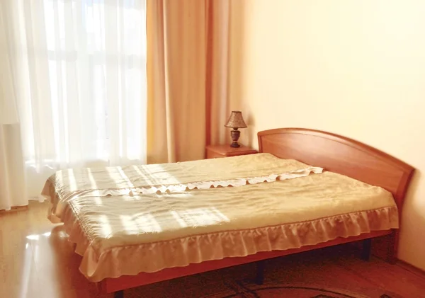 Bedroom furniture in a hotel room — Stock Photo, Image