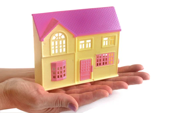 Country house model in female hands — Stock Photo, Image