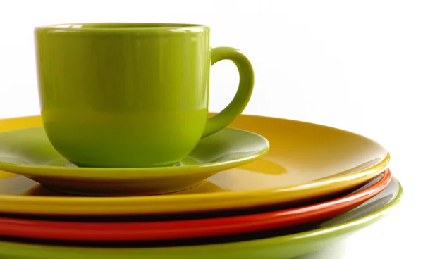 Teacup and saucer and  large plates — Stock Photo, Image