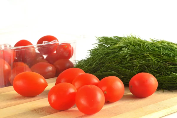 Cherry tomatoes and dill — Stock Photo, Image