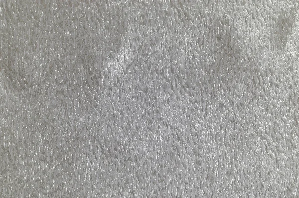 Küçük Gümüş Süslemelerle Süslü Parlak Bir Kumaş Arkaplan — Stok fotoğraf