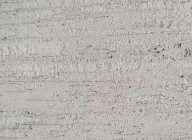 Duvar büyük kaya tuğlalarıyla kaplı. Eski yapı malzemeleri