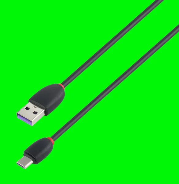 cable with USB and Type-C connector, isolated on a green background