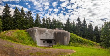 Orlicke hory, Czech republic - 07 13 2022: military bunker R-H-S 76 Lom at the Eagle Mountains, part of the Czechoslovak border fortifications from before World War II