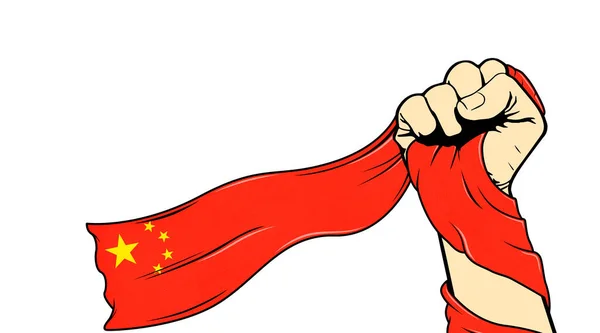 The hand holds the flag of China on a white background close up.