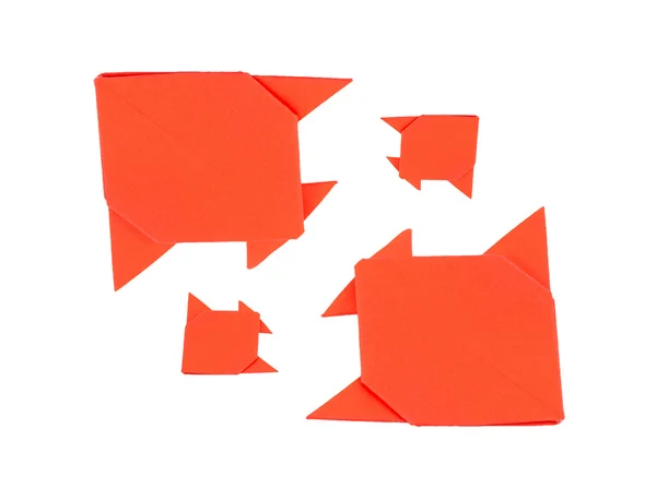 Four orange fish origami from paper on white background — Stock Photo, Image