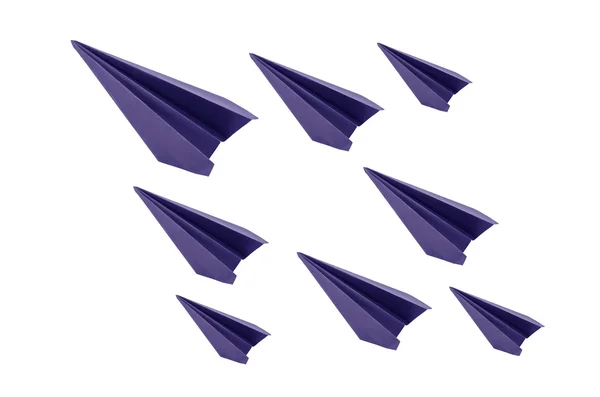 Origami åtta blått papper flygplan på vit bakgrund — Stockfoto