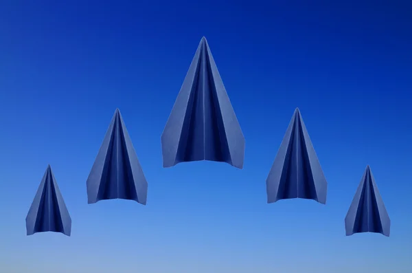 Origami five blue paper planes on blue sky background — Stock Photo, Image