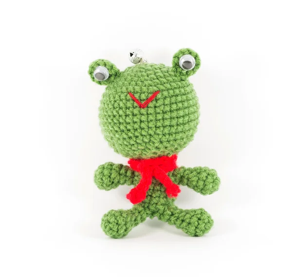 Handmade crochet green frog doll on white background — 图库照片