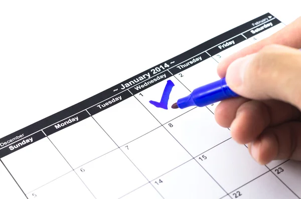 Blue check. Mark on the calendar at 1St January 2014 — Stock Photo, Image