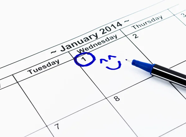 Círculo azul com sorriso. Marcar no calendário em 1St Janeiro 2014 — Fotografia de Stock