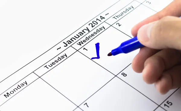 Blue check. Mark on the calendar at 1St January 2014 — Stock Photo, Image