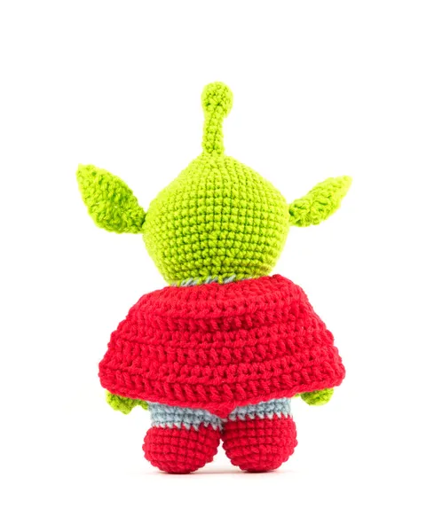 Handmade crochet green alien three eyes super hero doll on white — Stock Photo, Image