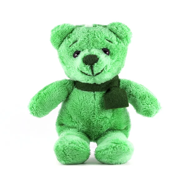 Hand gemachter Teddybär grüne Farbe mit Schal auf weißem Hintergrund — Stockfoto