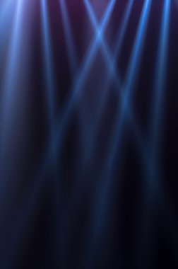 koyu arka plan üzerinde mavi ışık ışınları