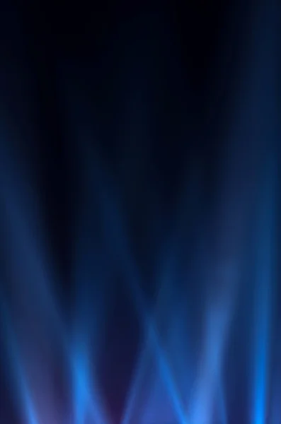 Blue luminous rays on a dark background — Stock Photo, Image