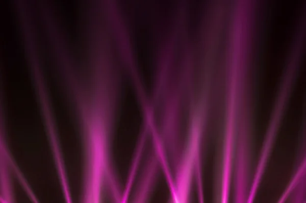 Pink luminous rays on a dark background — Stock Photo, Image