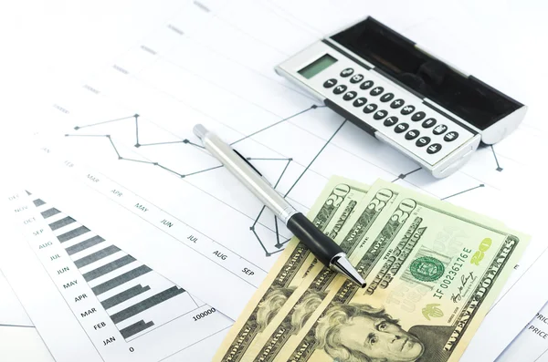 Stock graph report with calculator, pen and usd money for busine — Stock Photo, Image