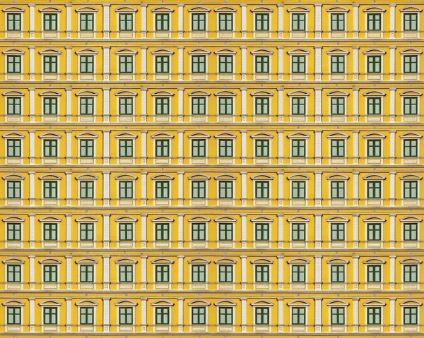 Multi windows żółte ściany, tło — Zdjęcie stockowe