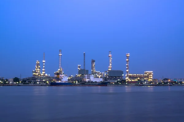 Oil and gas refinery at twilight - Petrochemical factory Stock Image