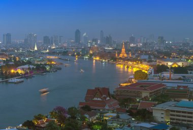 Bangkok cityscape river side at twilight which can see wat arun 