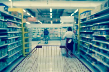 Mağaza mağaza bokeh arka plan, iş süpermarket ve bulanık alışveriş ve arka plan kavramı arabası ile soyut bulanık fotoğraf