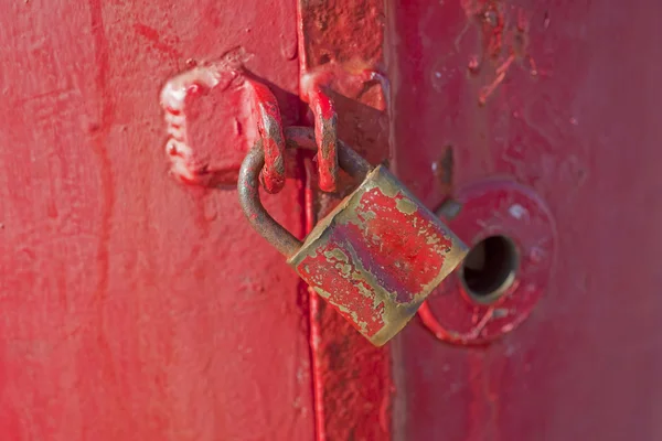 Locked red door — Stock Photo, Image