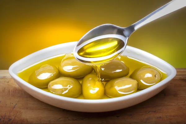 Olives in oil — Stock Photo, Image