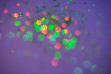 Blurred Violet lilac sparkling background. Color of the year.