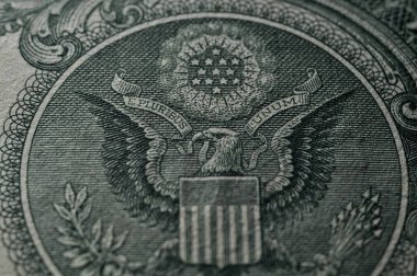 Signs and symbols on the US dollar bill. Macro