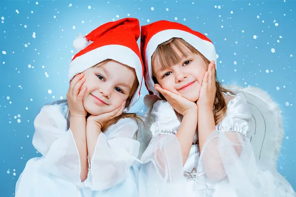 Dos niñas navideñas Imágenes de stock libres de derechos
