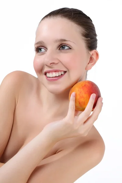 Beauty Girl. Beautiful Young Woman with Fresh Clean Skin and peach — Stock Photo, Image