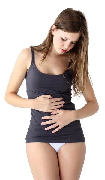 Woman's hands on stomach on white background — Stock Photo, Image
